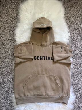 Essentials Men's Tan Logo Hoodie with Black Print